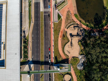 High angle view of road by buildings in city