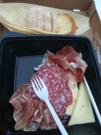 High angle view of meat in plate on table