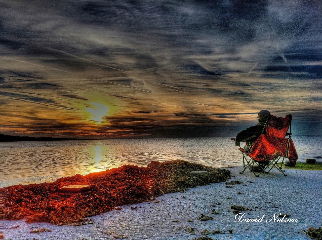 water, sky, sea, beach, cloud - sky, scenics, shore, tranquil scene, nature, tranquility, rock - object, red, beauty in nature, idyllic, outdoors, sand, horizon over water, wave