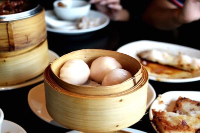 Close-up of dim sum in containers