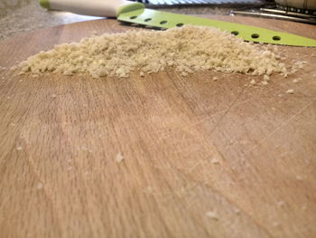 High angle view of chopped bread on cutting board