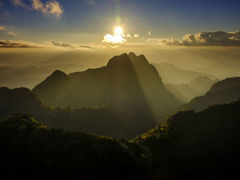 Scenic view of mountains against sky during sunset