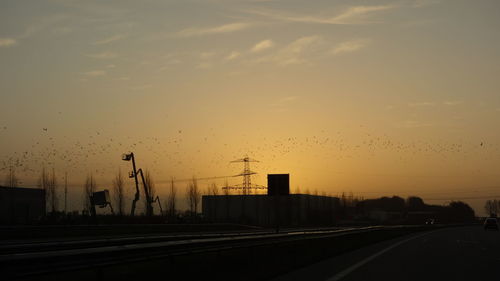 Road against sky at sunset