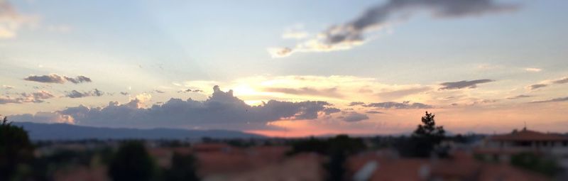 Clouds over mountain range