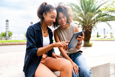 Young woman using mobile phone