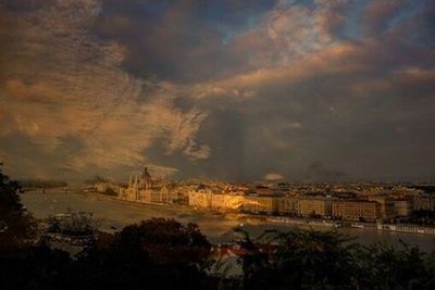 Scenic view of sea against cloudy sky