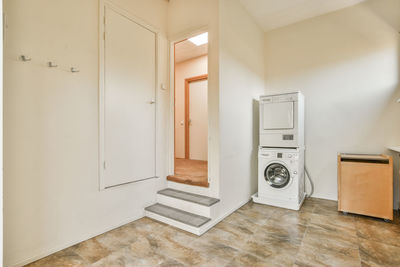 High angle view of person standing in bathroom