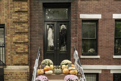 Front of apartment building decorated with spider web for halloween holiday in manhattan new york