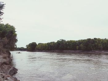 Scenic view of river against clear sky