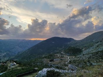 Scenic view of mountains against sky during sunset