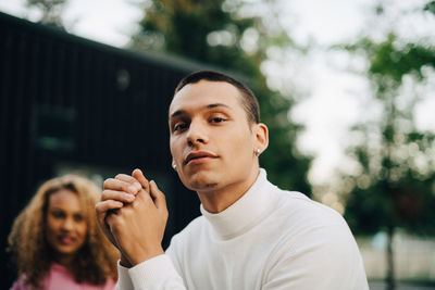 Portrait of friends against blurred background