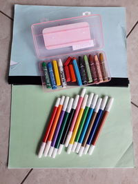 High angle view of multi colored pencils on table