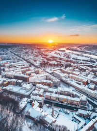 High angle view of city buildings during winter