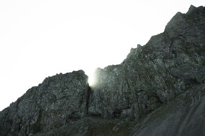 Low angle view of mountain against clear sky