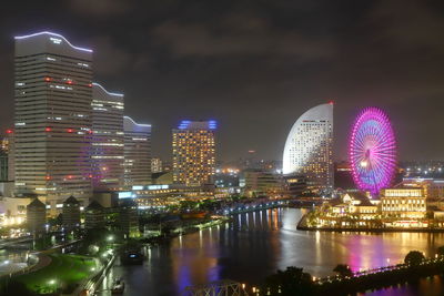 Illuminated city buildings at night