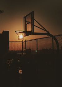 Low angle view of basketball hoop against sky