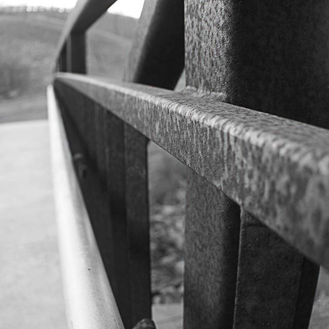 close-up, wood - material, focus on foreground, metal, wooden, indoors, railing, old, part of, cropped, wood, day, no people, architectural column, selective focus, metallic, built structure, sunlight, pattern