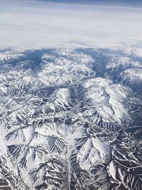 High angle view of mountains against sky