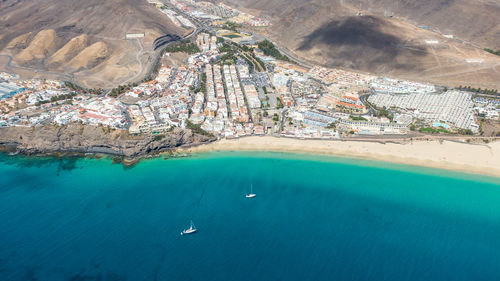 High angle view of sailboats in sea