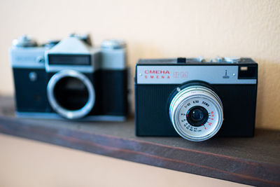 Close-up of camera on table