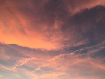 Low angle view of dramatic sky during sunset