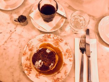 High angle view of coffee served on table