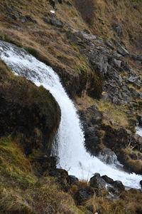 Stream flowing through rocks