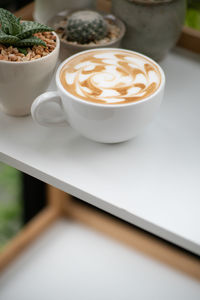 Coffee cup on table