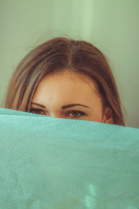 Close-up portrait of a serious young woman