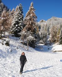 Full length of person on snow covered mountain