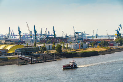 Nautical vessel on river against sky