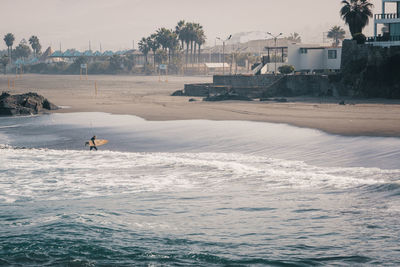 Man surfing in sea