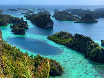 Scenic view of sea and rocks at lagoon misool island raja ampat 