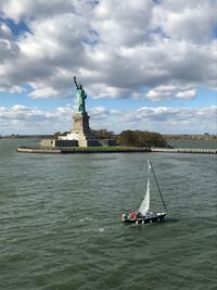 Statue on boat in sea