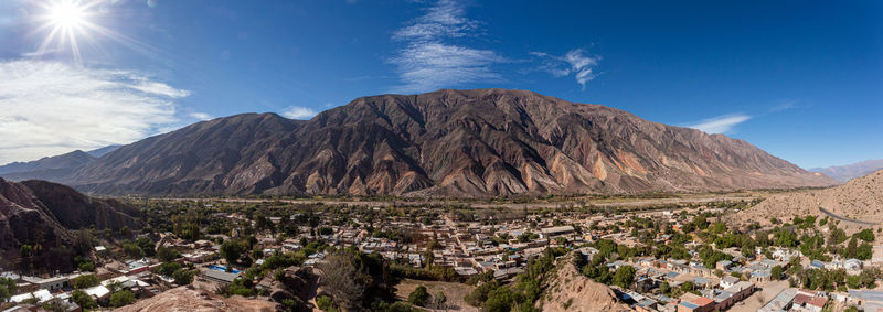 Panoramic view of volcanic landscape against sky