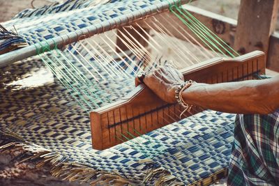High angle view of man working in basket