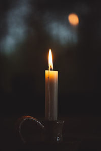 Close-up of illuminated candle