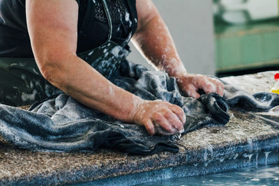 Midsection of man working