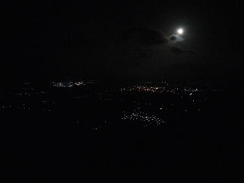 Illuminated cityscape at night