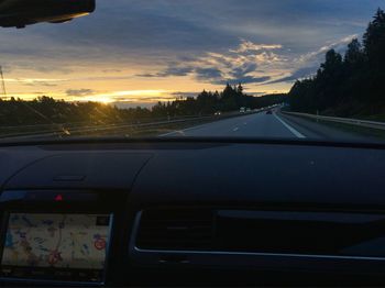 Road seen through car windshield