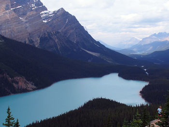 Scenic view of peyto lake and mountains against sky