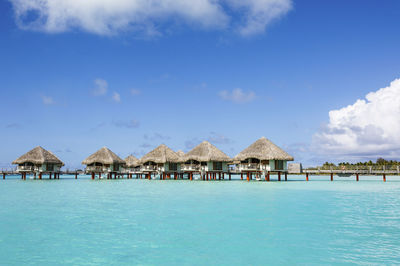 Panoramic view of sea and houses against sky