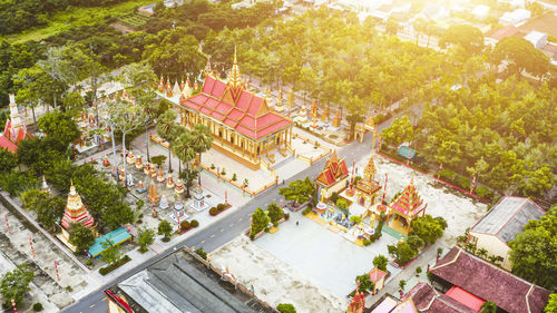 High angle view of building and trees in city