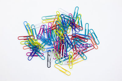 Close-up of multi colored pencils against white background