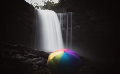 Scenic view of waterfall in forest