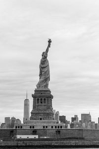 Low angle view of statue against sky