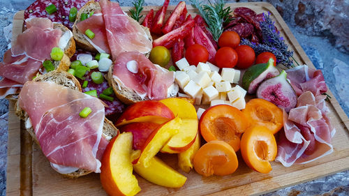 High angle view of chopped fruits on table