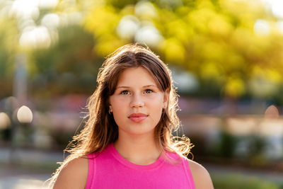 Portrait of young woman looking away