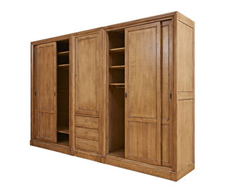 Open wooden cabinet against white background