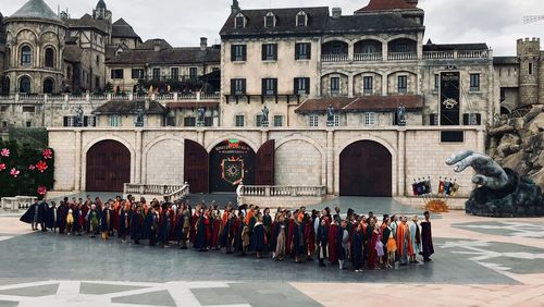 Group of people in front of building